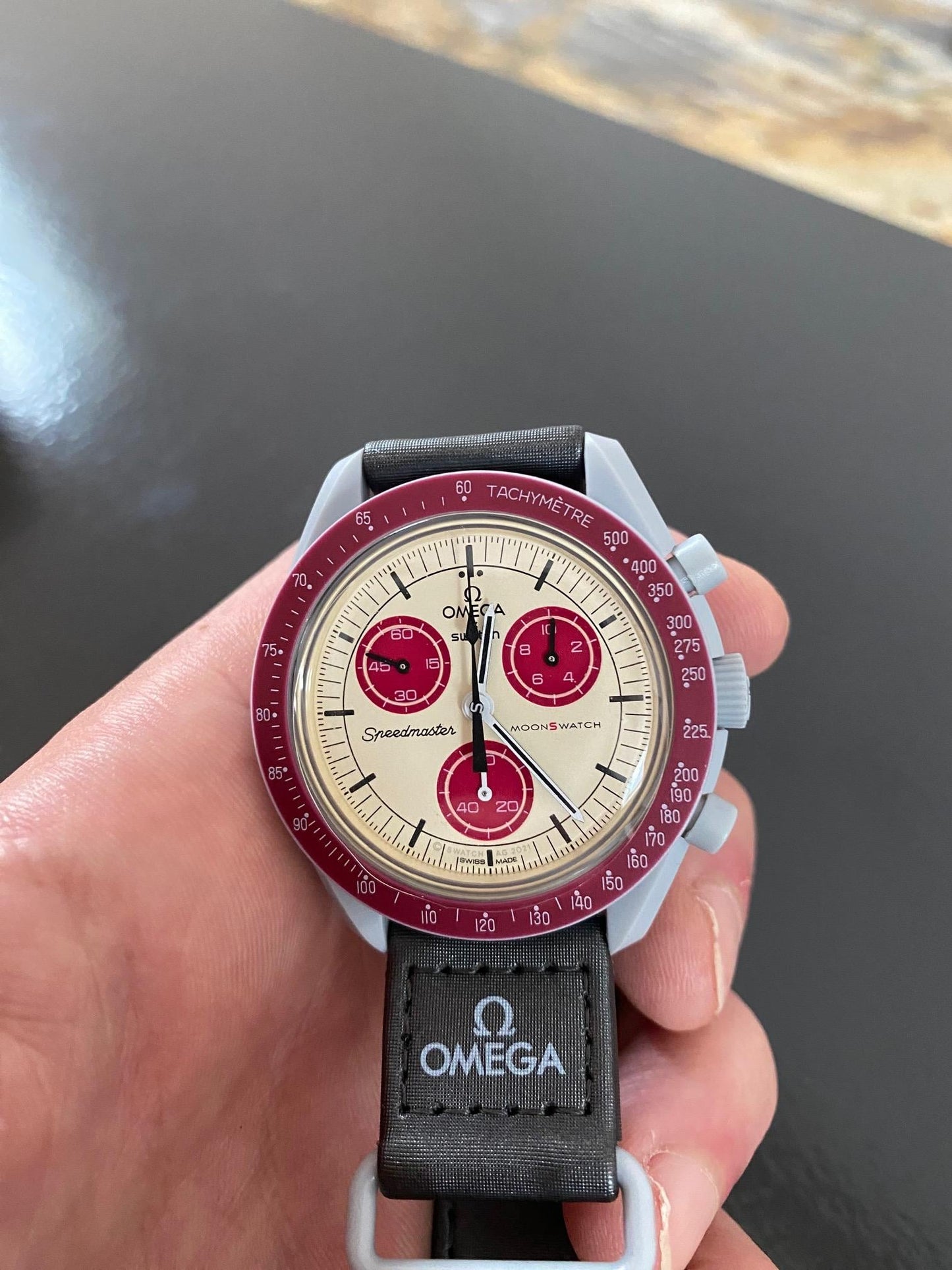 Swatch Omega x Moon Mission To Pluto Speedmaster Brownish Red and Tan Moonswatch